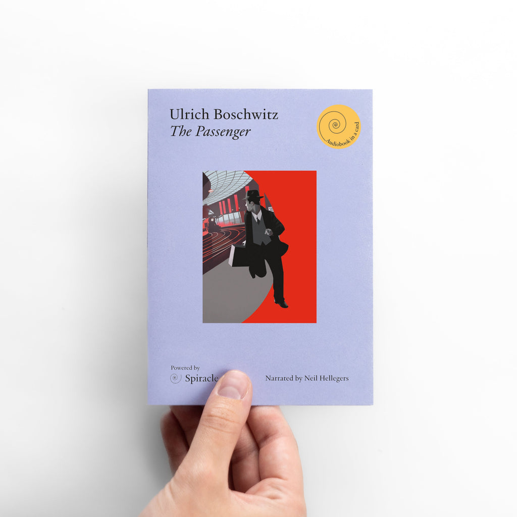 Book titled 'The Passenger' by Ulrich Boschwitz held by a hand on a white background